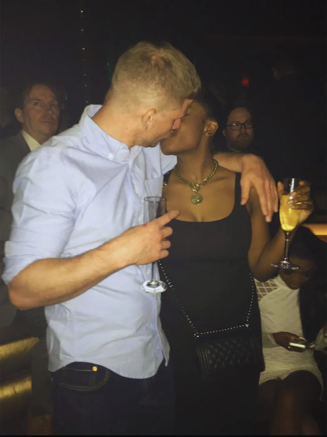 Ed kissing a woman on a night out